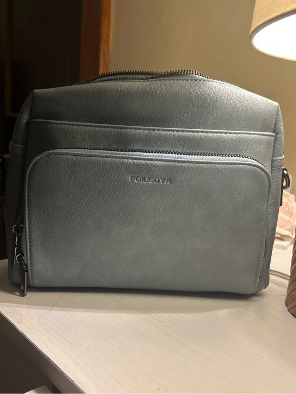 Poiugoya Leather Crossbody Bag in Light Blue